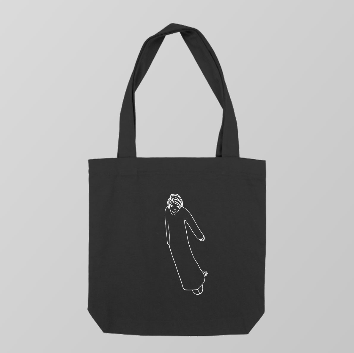 Tote bag negro - personaje femenino volando